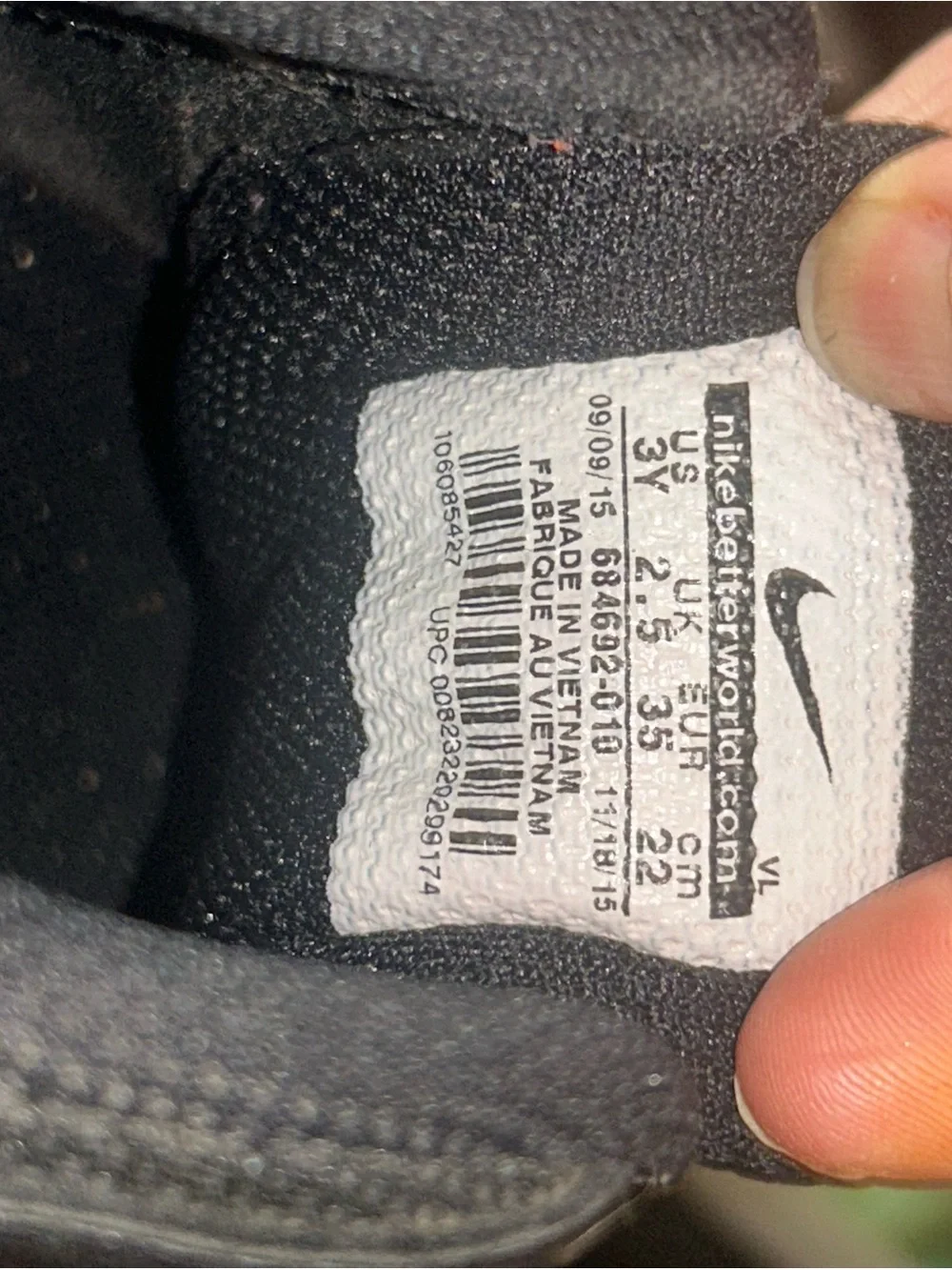 Nike Black and White Football Cleats with Silver Accents